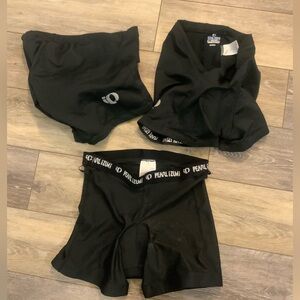 Set of three Pearl Izumi biking shorts. Size M
